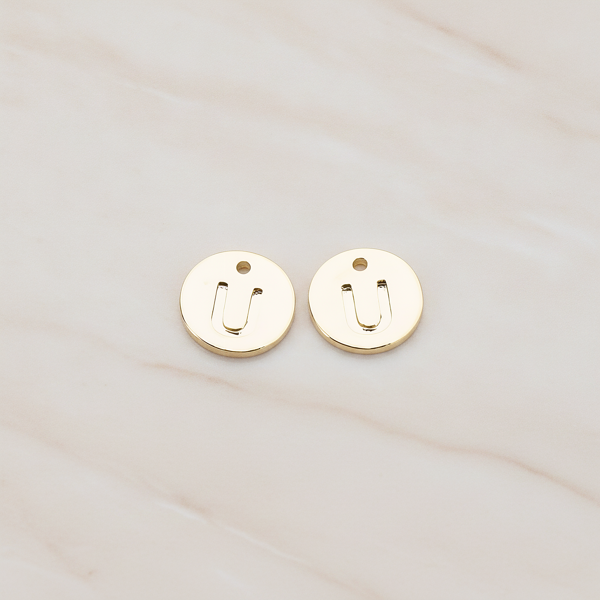 Round Disk Initial Pendant, 2 Pc on warm marble background (PD.219)