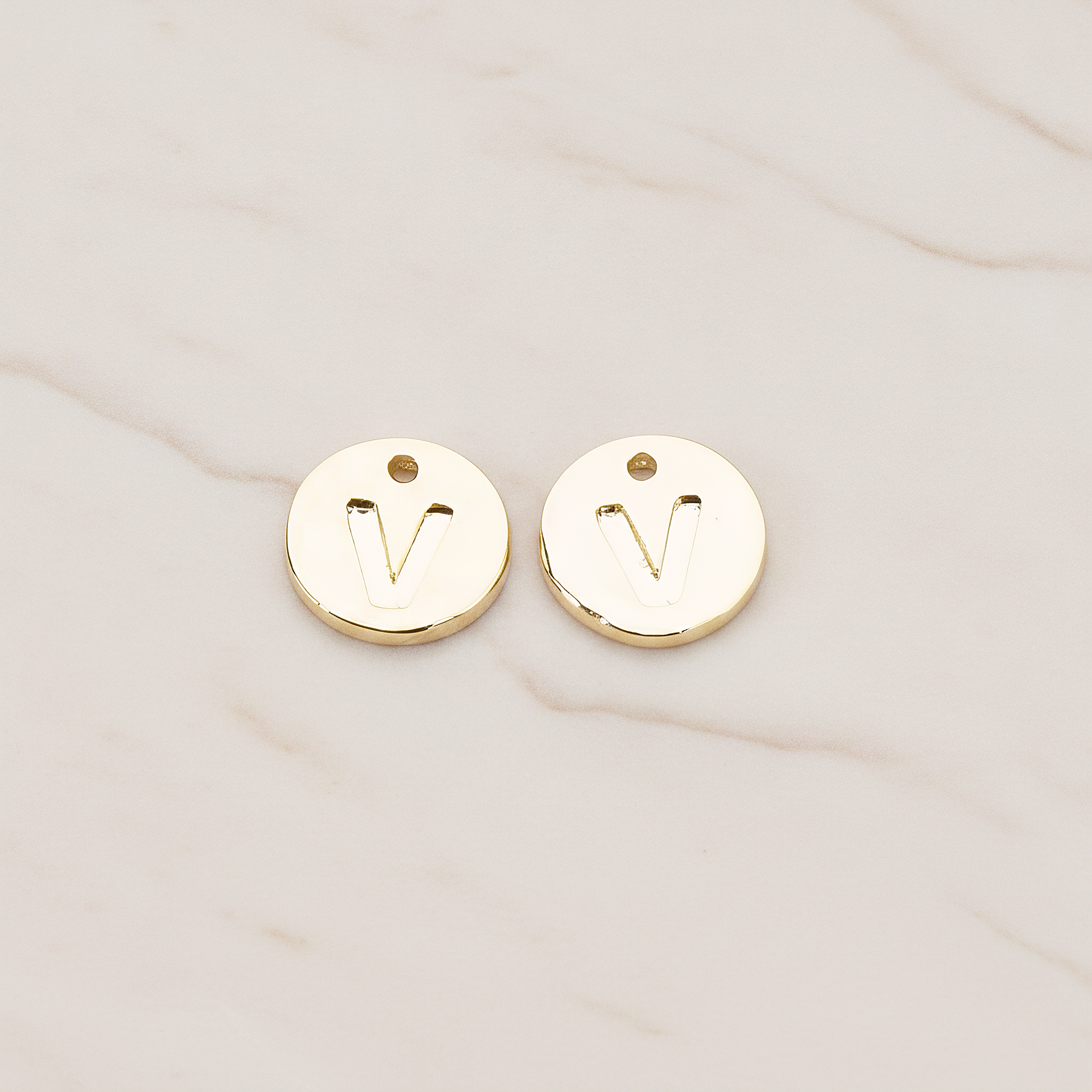 Round Disk Initial Pendant, 2 Pc on warm marble background (PD.219)