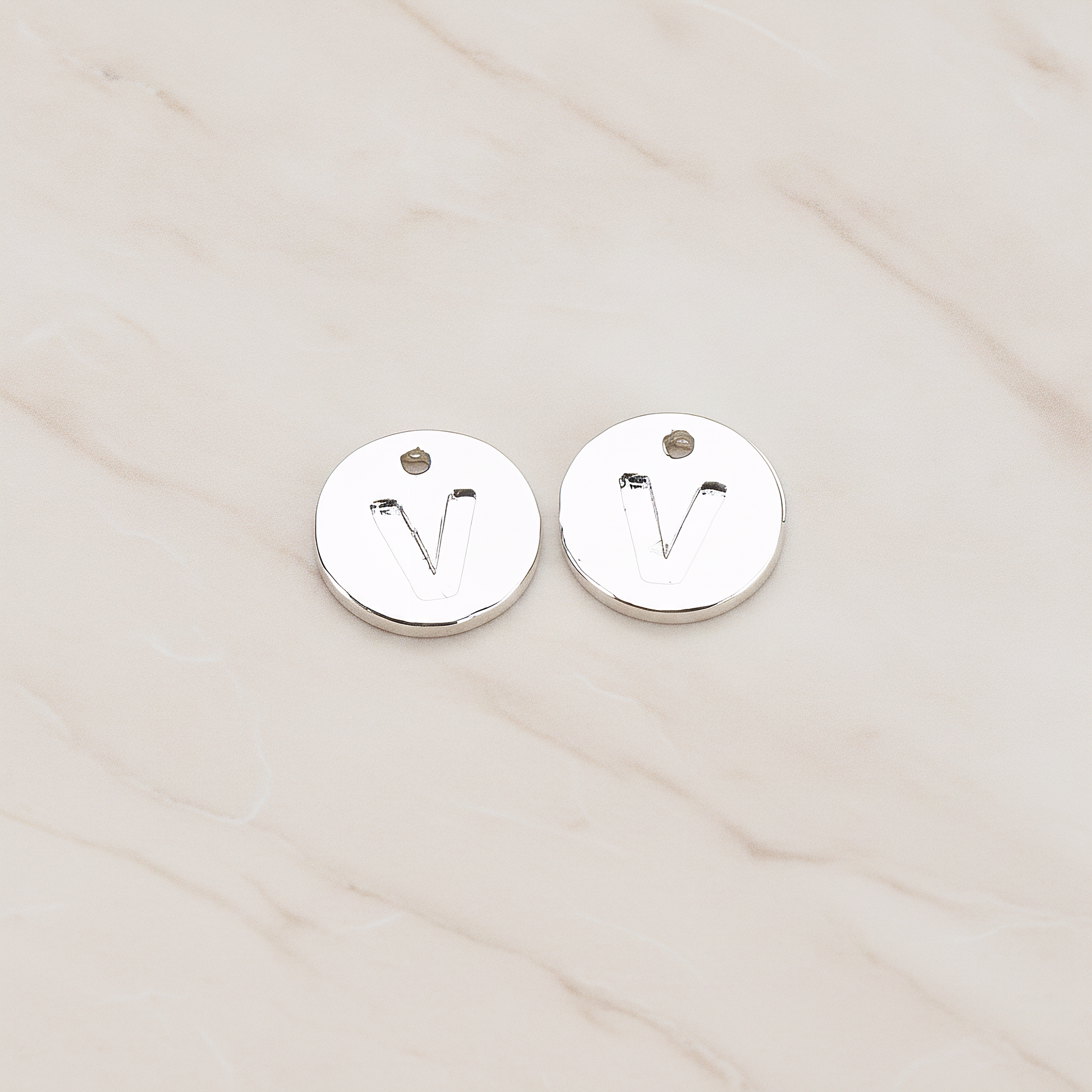 Round Disk Initial Pendant, 2 Pc on warm marble background (PD.219)