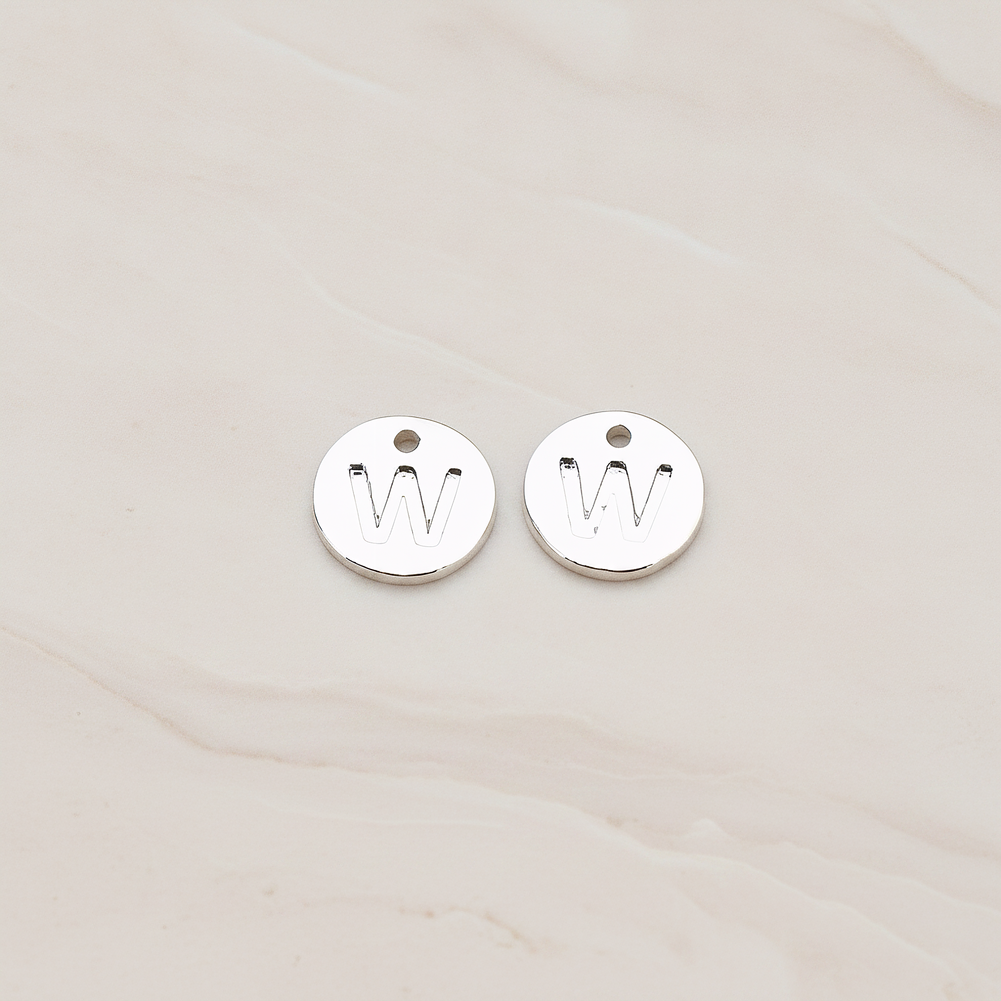 Round Disk Initial Pendant, 2 Pc on warm marble background (PD.219)