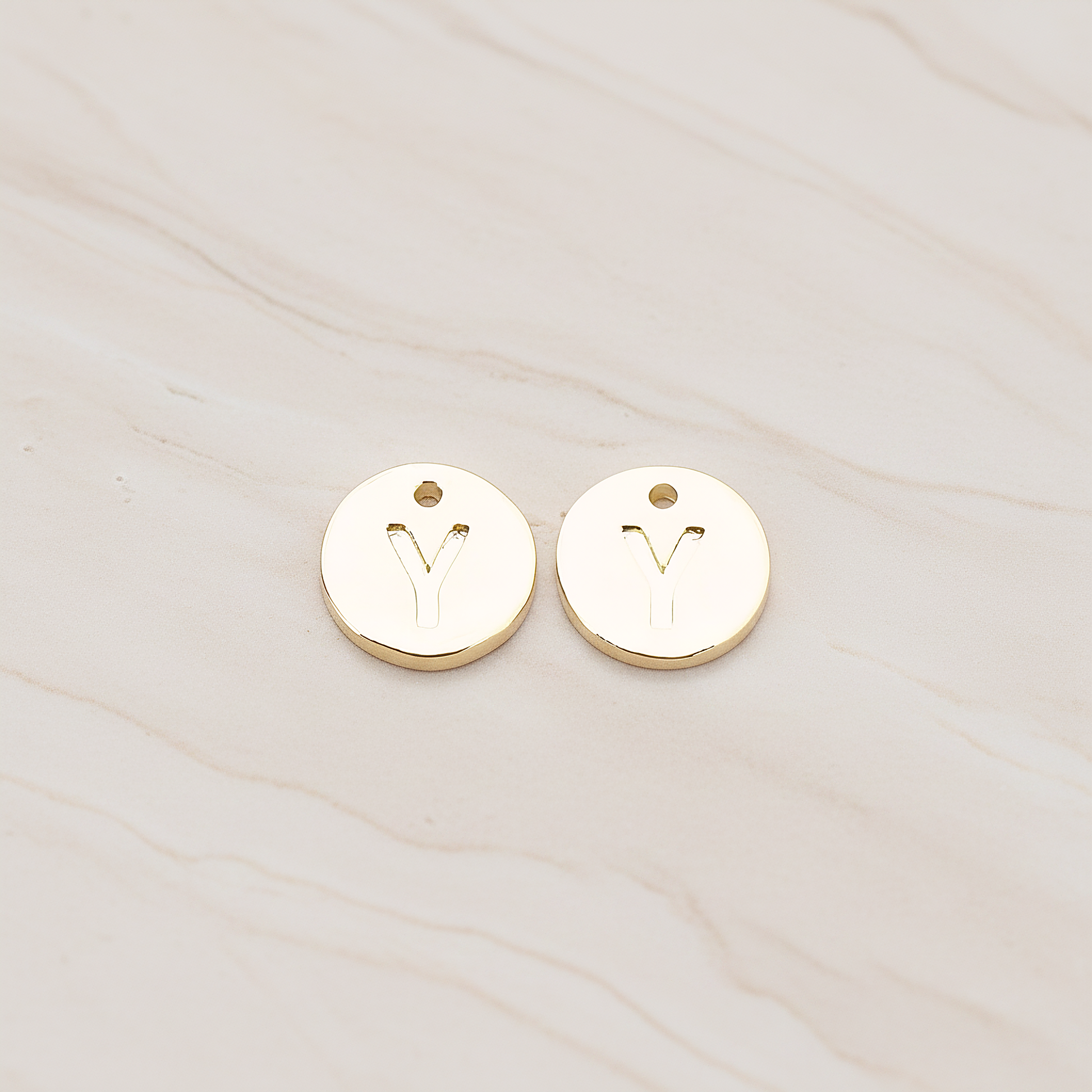 Round Disk Initial Pendant, 2 Pc on warm marble background (PD.219)