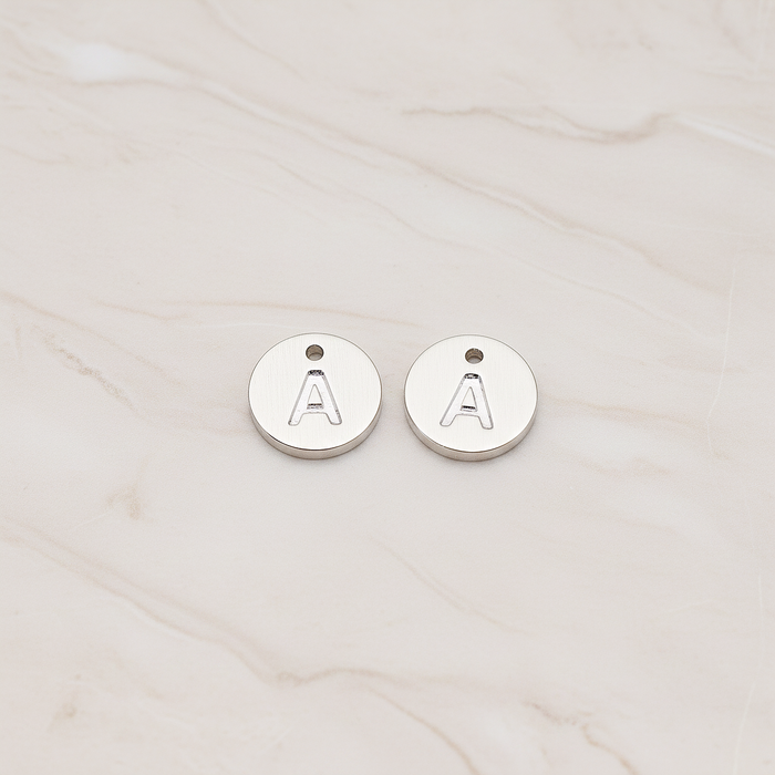 Round Disk Initial Pendant, 2 Pc on warm marble background (PD.219)