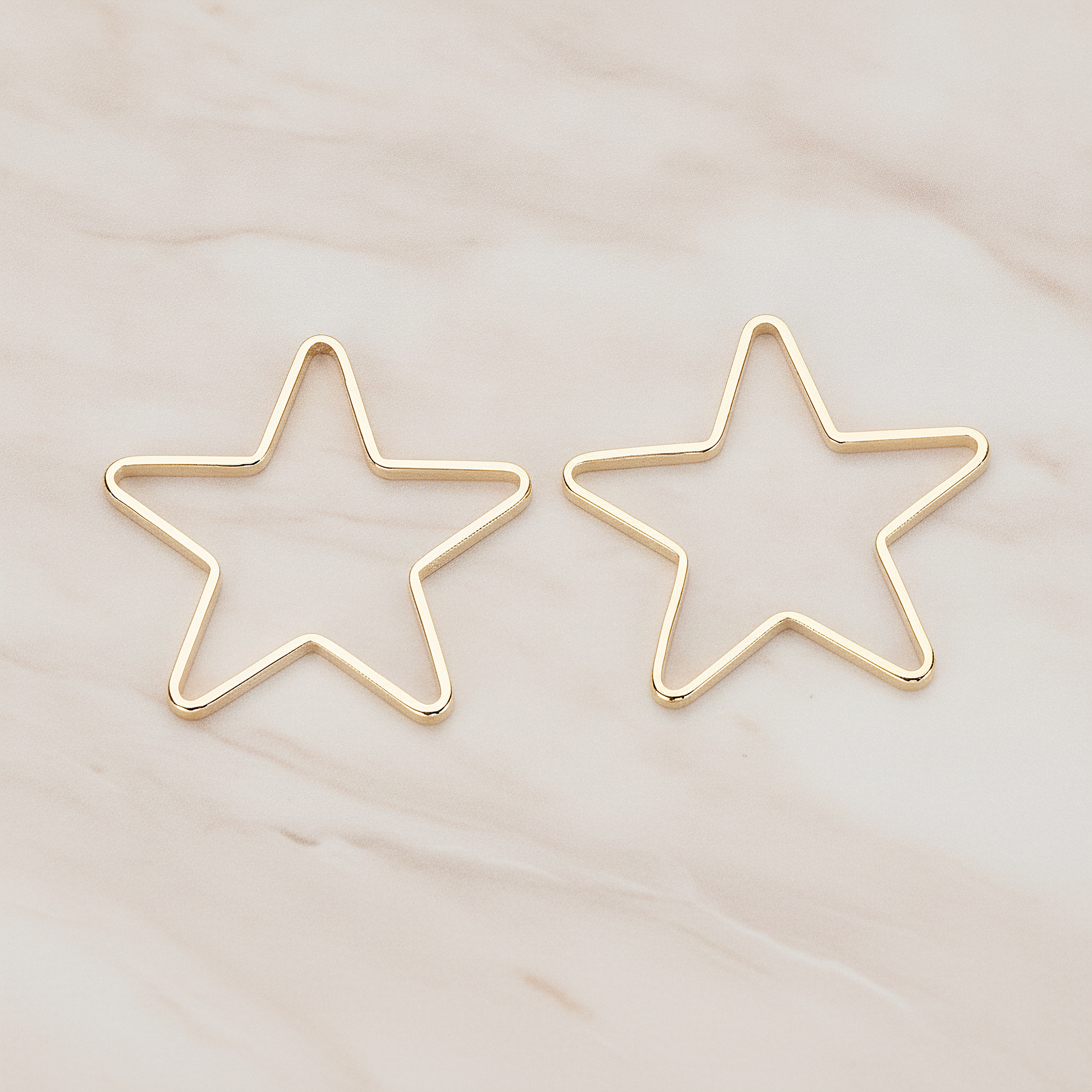 18mm Star Link Pendant, 4 Pc on warm marble background (PD.1008-02)