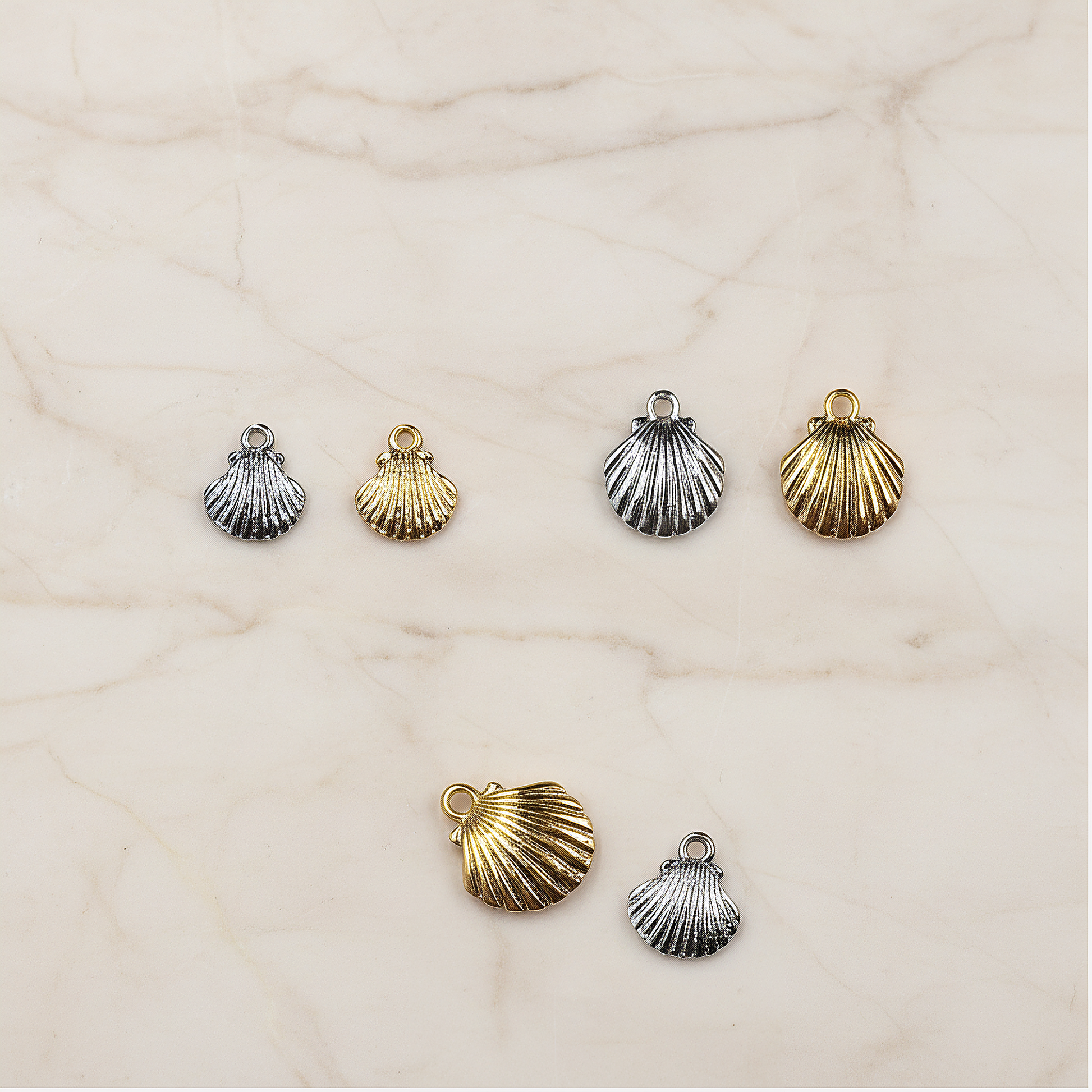 Shell Ring Pendant, Jewelry Supplies, Jewelry Making, (Gold, Rhodium Plated), 2 Pc on warm marble background (PD.0014-06)