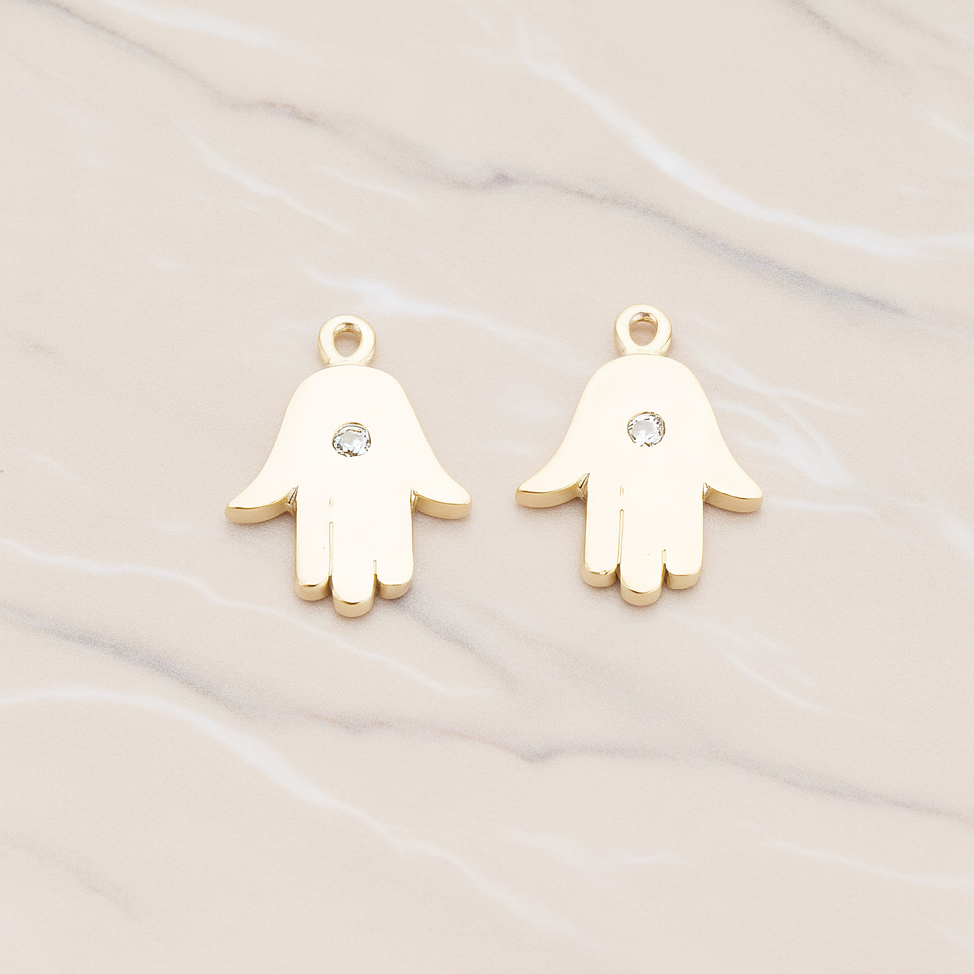 Cubic Setting Hamsa Pendant, 2 Pc on warm marble background (PD.1018)