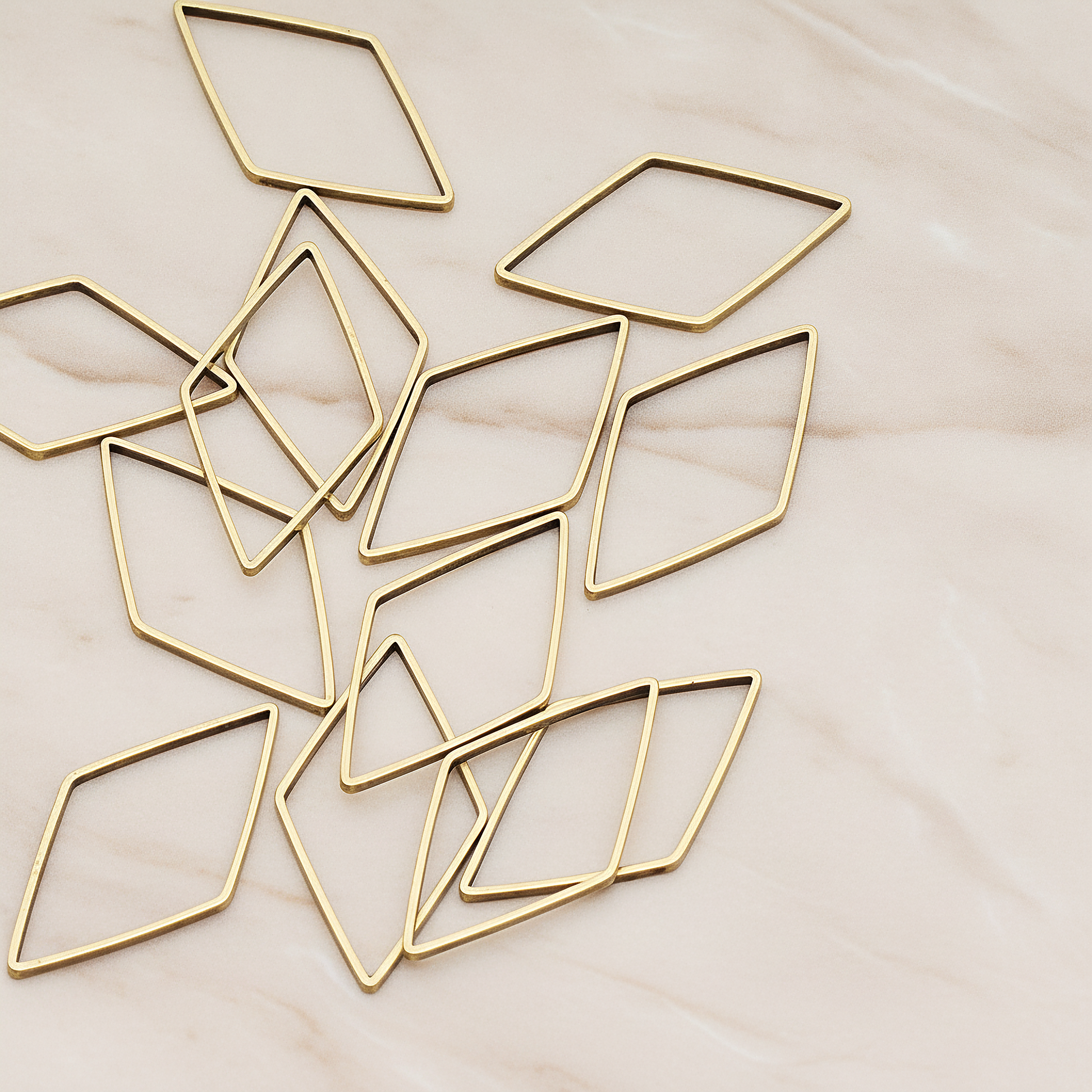 Large Diamond Shaped Link Pendant, 4 Pc on warm marble background (PD.1025-02)