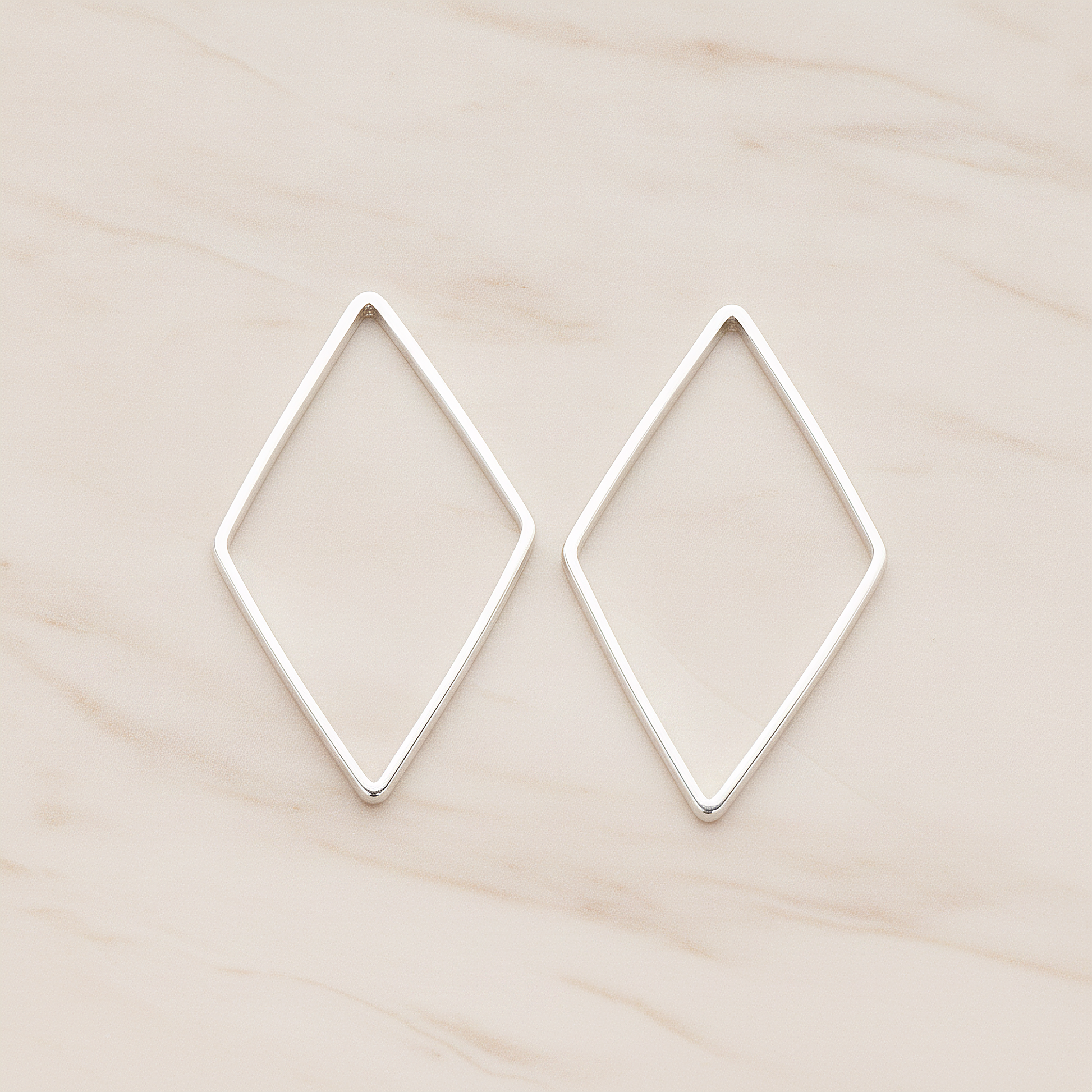 Large Diamond Shaped Link Pendant, 4 Pc on warm marble background (PD.1025-02)
