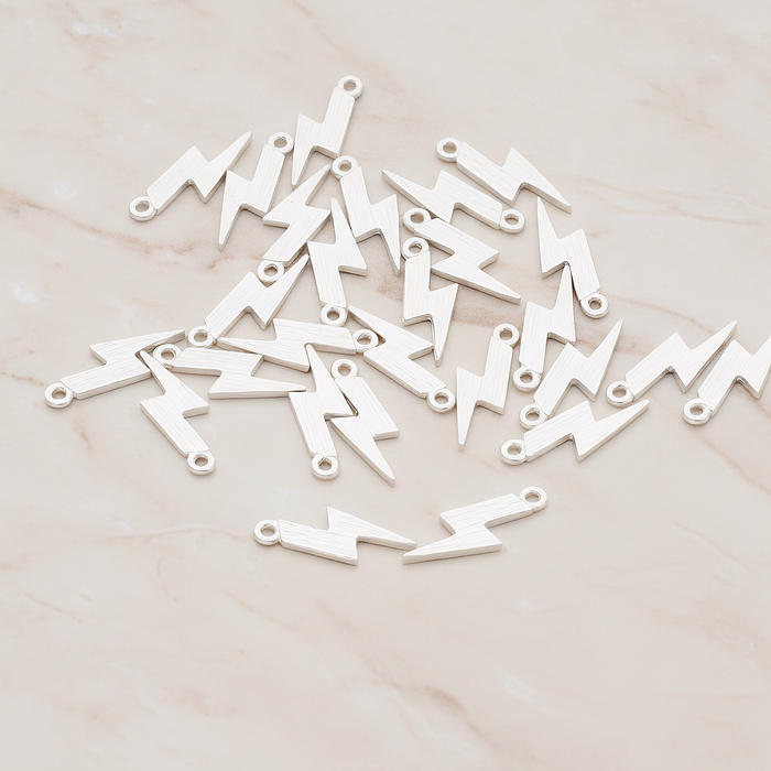 Brushed Lightening Pendant, 2 Pc on warm marble background (PD.1035)