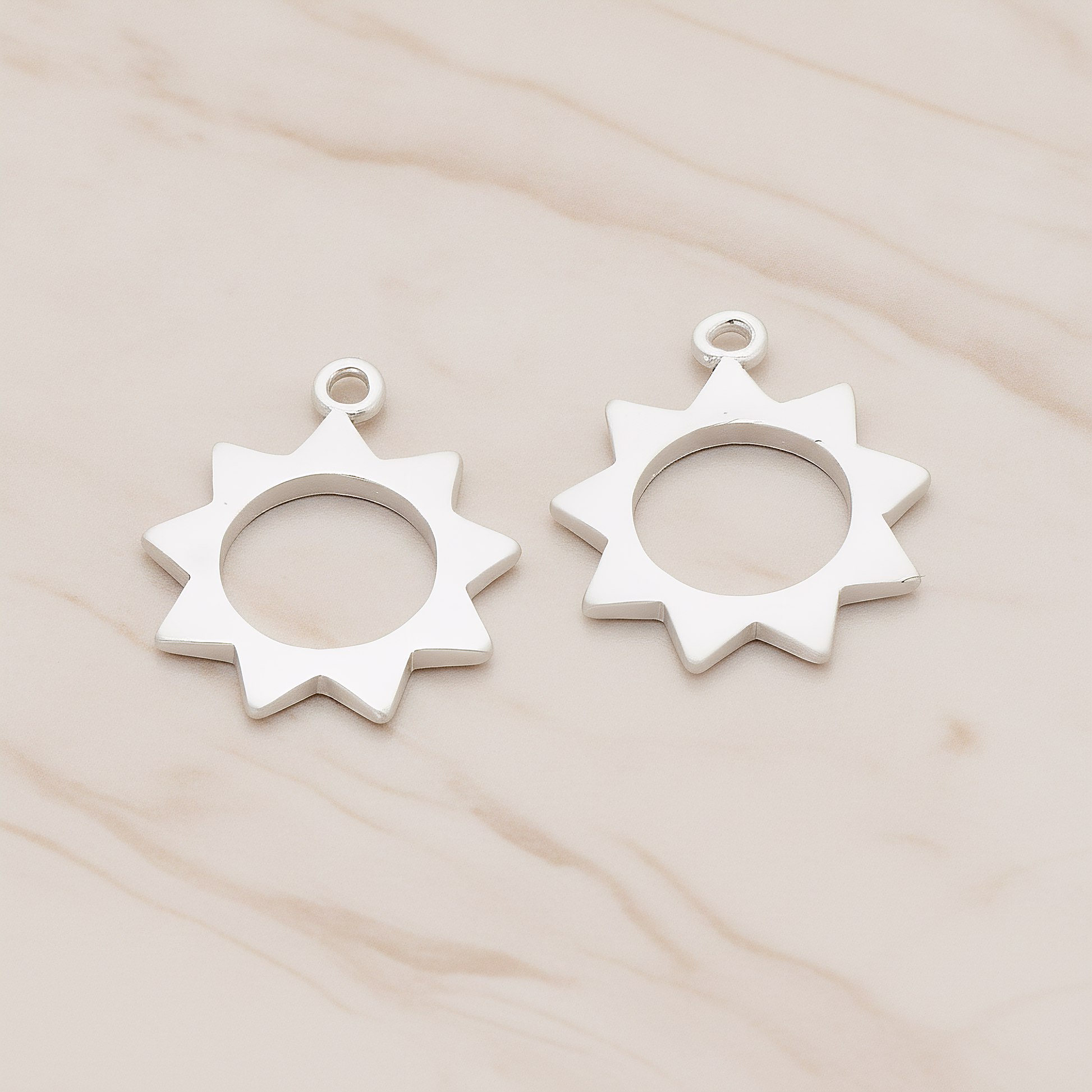Simple Shaped Sun Pendant, 2 Pc on warm marble background (PD.1037)