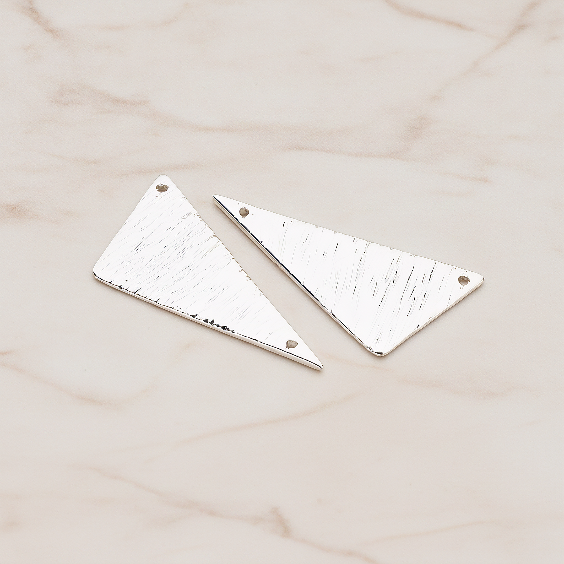 Brushed Triangle Pendant, 2 Pc on warm marble background (PD.1042)