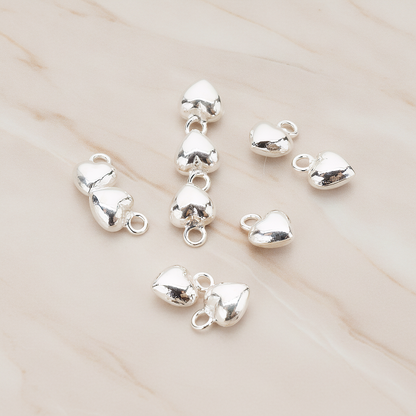 925 Sterling Silver Mini Heart Pendant, 2 Pc on warm marble background (PD.1057)