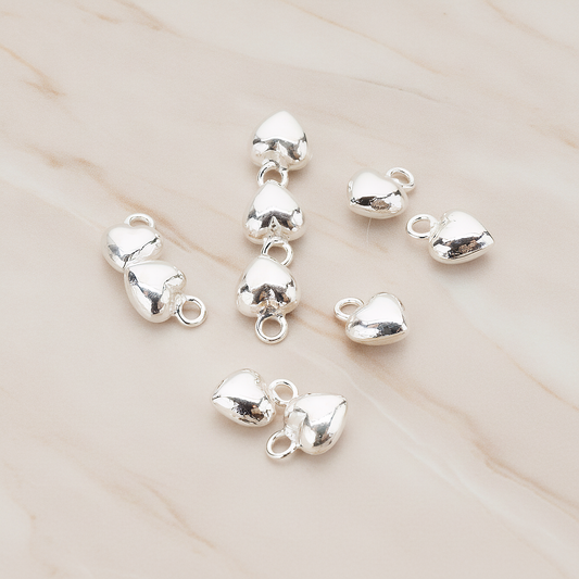 925 Sterling Silver Mini Heart Pendant, 2 Pc on warm marble background (PD.1057)