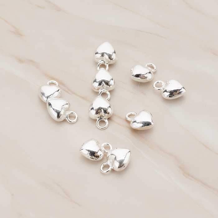 925 Sterling Silver Mini Heart Pendant, 2 Pc on warm marble background (PD.1057)