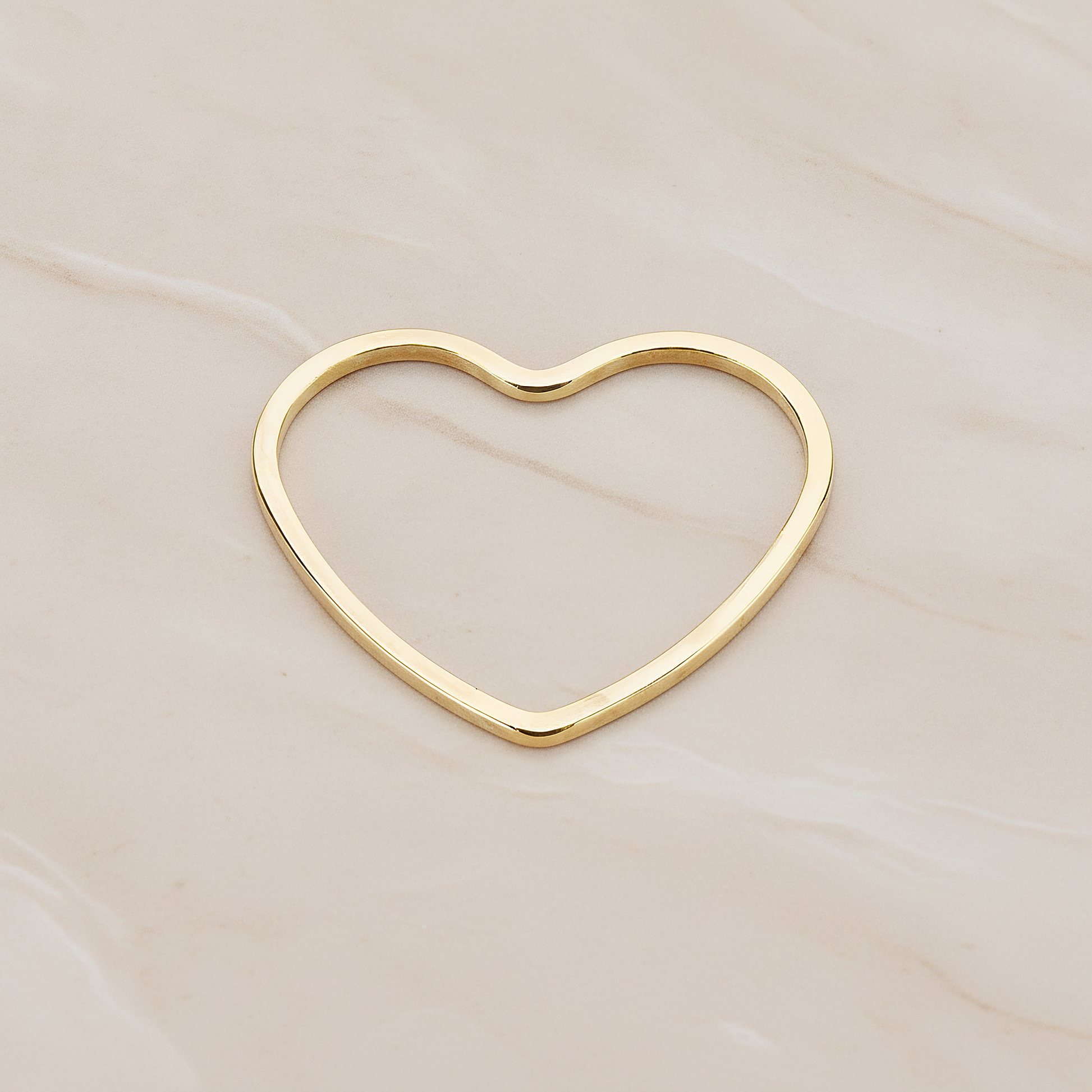 Heart Shaped Link Pendant, 4 Pc on warm marble background (PD.1060)