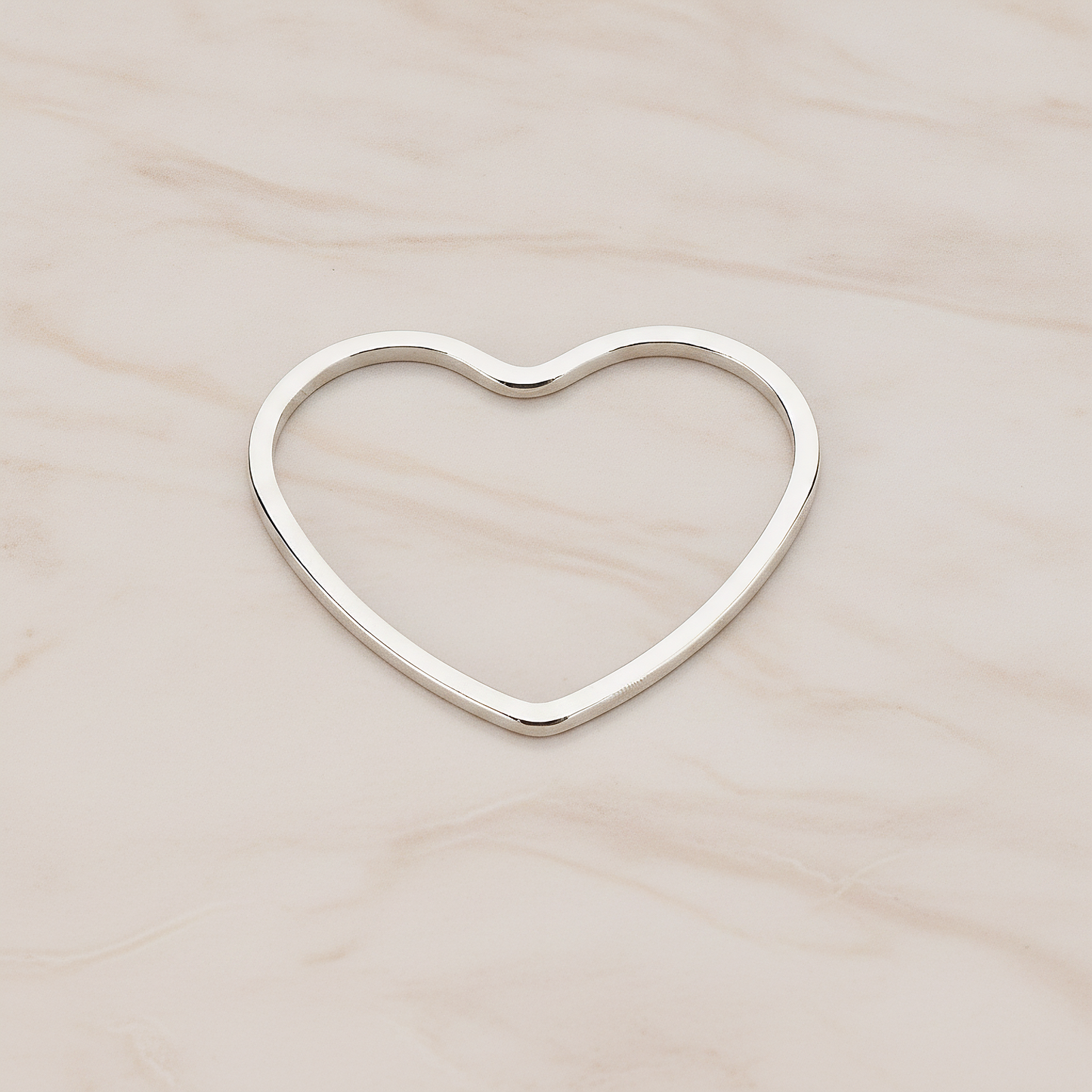 Heart Shaped Link Pendant, 4 Pc on warm marble background (PD.1060)