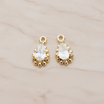 Teardrop Framed Cubic Setting Pendant, 2 Pc on warm marble background (PD.1076)