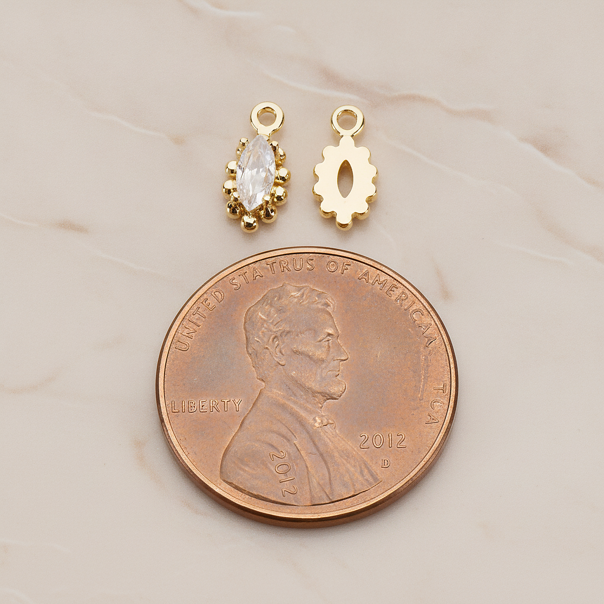 Oval Framed Cubic Setting Pendant, 2 Pc on warm marble background (PD.1077)