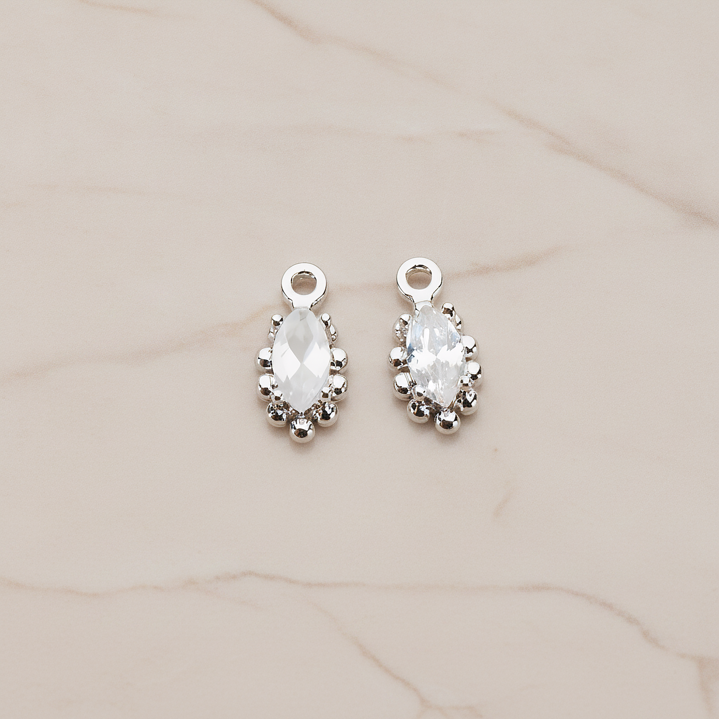 Oval Framed Cubic Setting Pendant, 2 Pc on warm marble background (PD.1077)