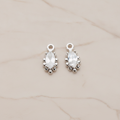 Oval Framed Cubic Setting Pendant, 2 Pc on warm marble background (PD.1077)