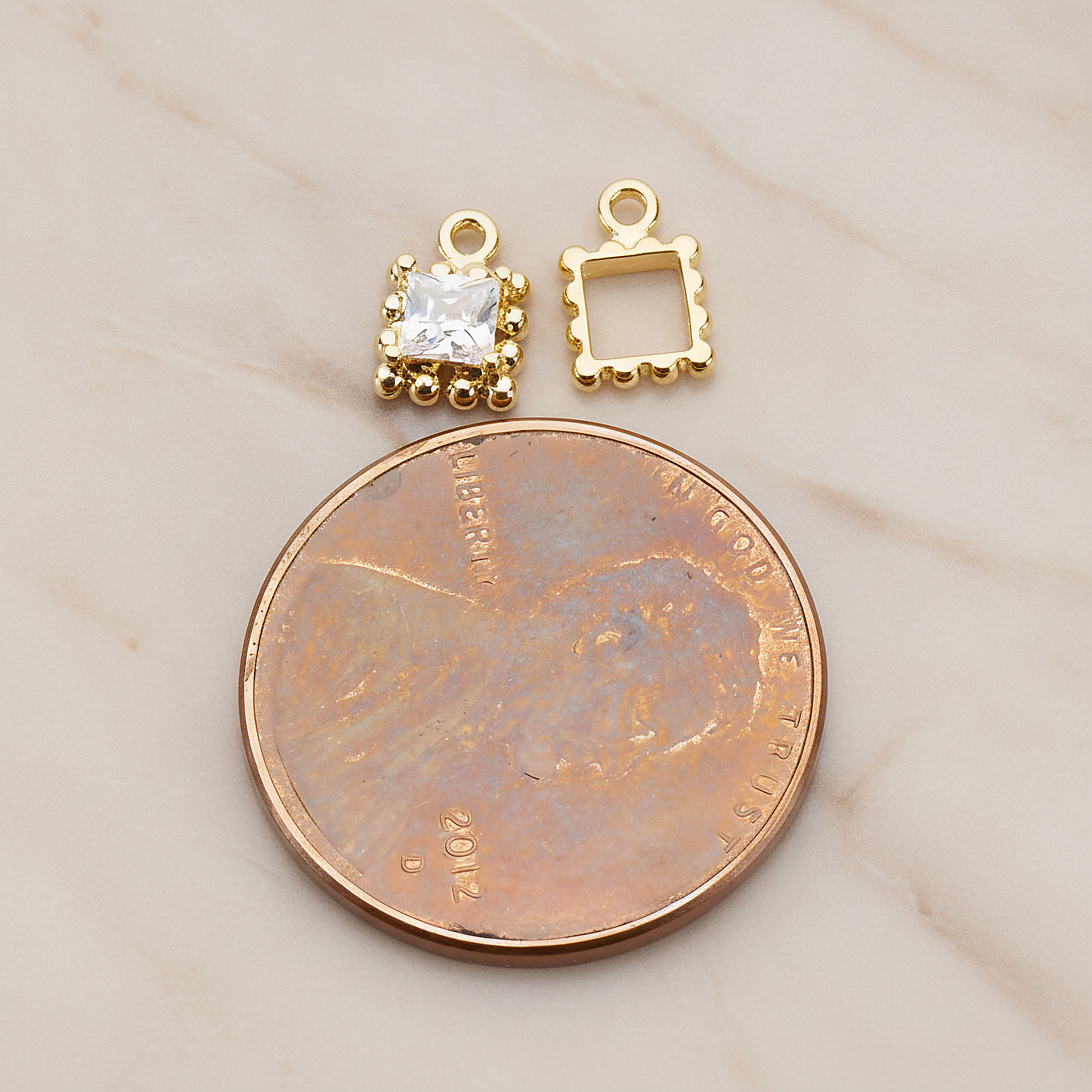Square Framed Cubic Setting Pendant, 2 Pc on warm marble background (PD.1078)