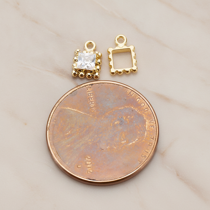Square Framed Cubic Setting Pendant, 2 Pc on warm marble background (PD.1078)