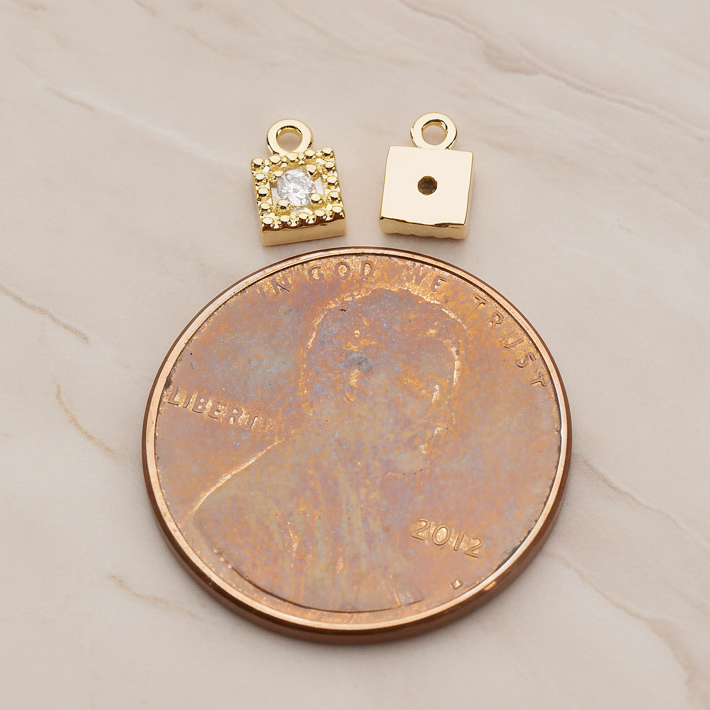 Square Framed Cubic Setting Pendant, 2 Pc on warm marble background (PD.1079)