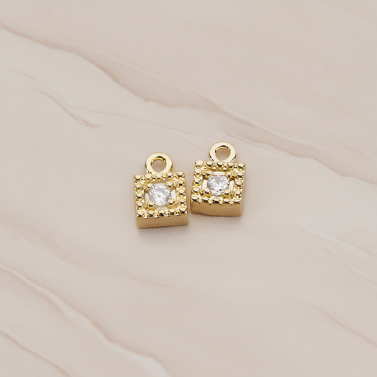 Square Framed Cubic Setting Pendant, 2 Pc on warm marble background (PD.1079)