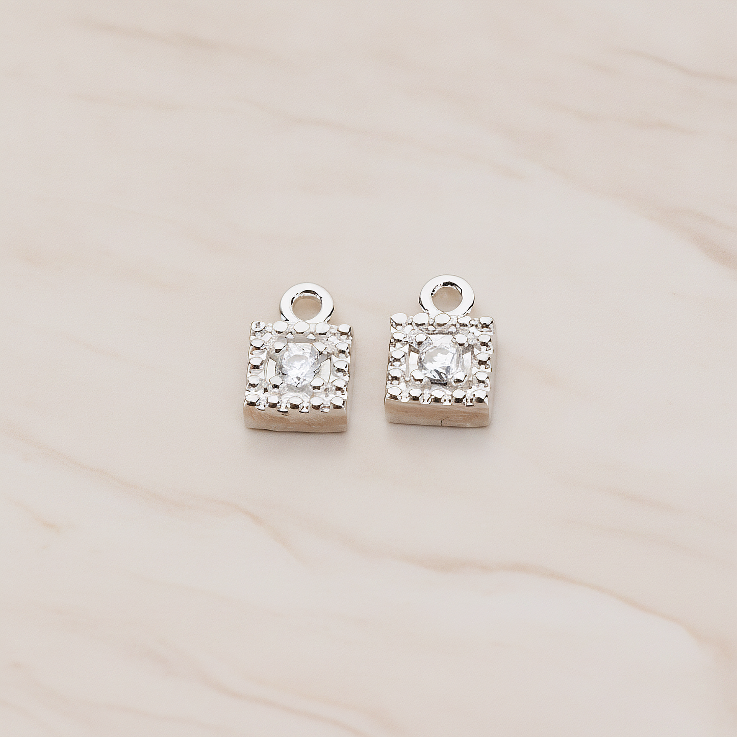 Square Framed Cubic Setting Pendant, 2 Pc on warm marble background (PD.1079)