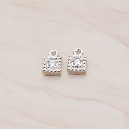 Square Framed Cubic Setting Pendant, 2 Pc on warm marble background (PD.1079)