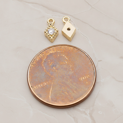 Diamond Shaped Framed Cubic Setting Pendant, 2 Pc on warm marble background (PD.1080)