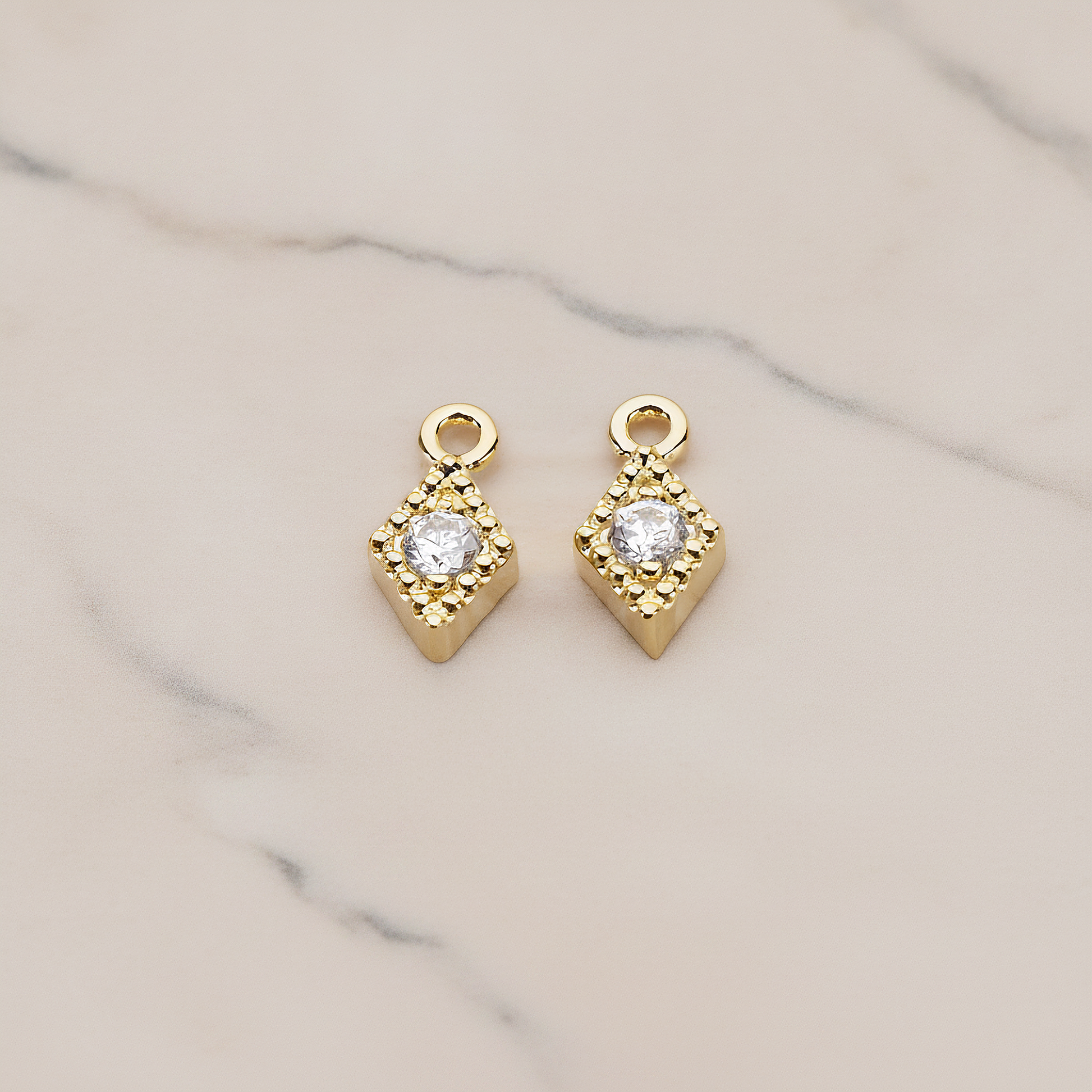 Diamond Shaped Framed Cubic Setting Pendant, 2 Pc on warm marble background (PD.1080)