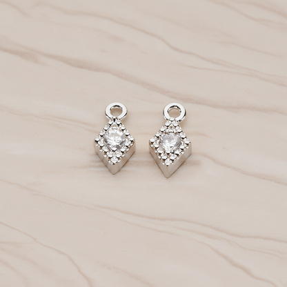 Diamond Shaped Framed Cubic Setting Pendant, 2 Pc on warm marble background (PD.1080)