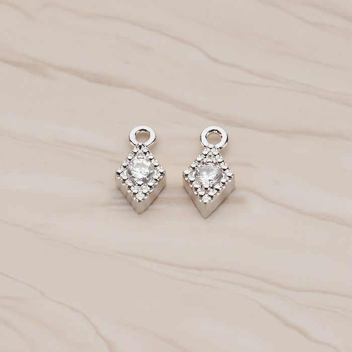 Diamond Shaped Framed Cubic Setting Pendant, 2 Pc on warm marble background (PD.1080)