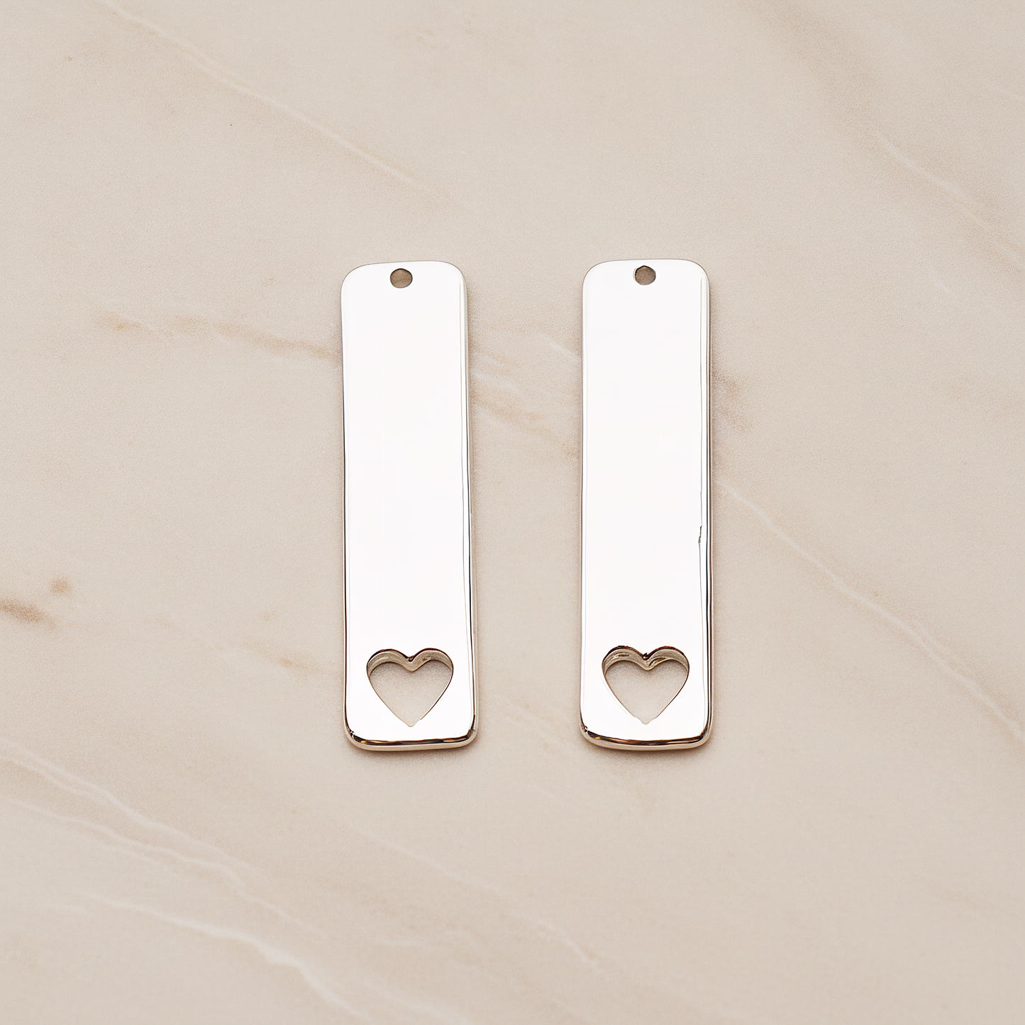Vertical Heart Silhouette Bar Pendant, 2 Pc on warm marble background (PD.1150)