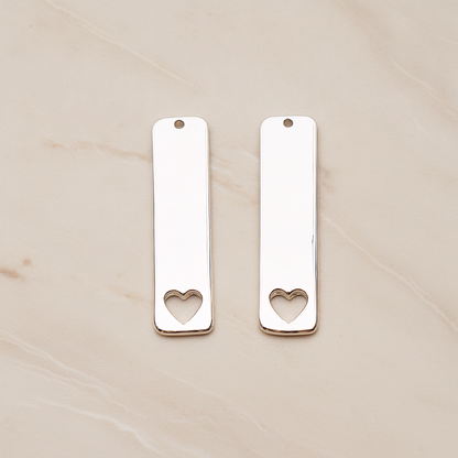 Vertical Heart Silhouette Bar Pendant, 2 Pc on warm marble background (PD.1150)