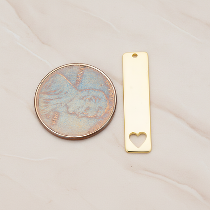 Vertical Heart Silhouette Bar Pendant, 2 Pc on warm marble background (PD.1150)