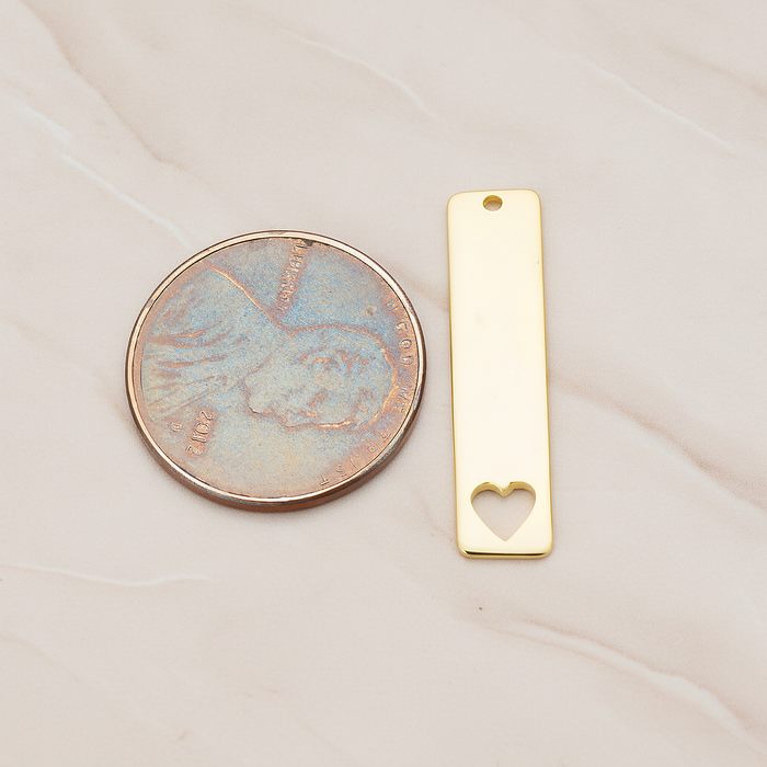 Vertical Heart Silhouette Bar Pendant, 2 Pc on warm marble background (PD.1150)