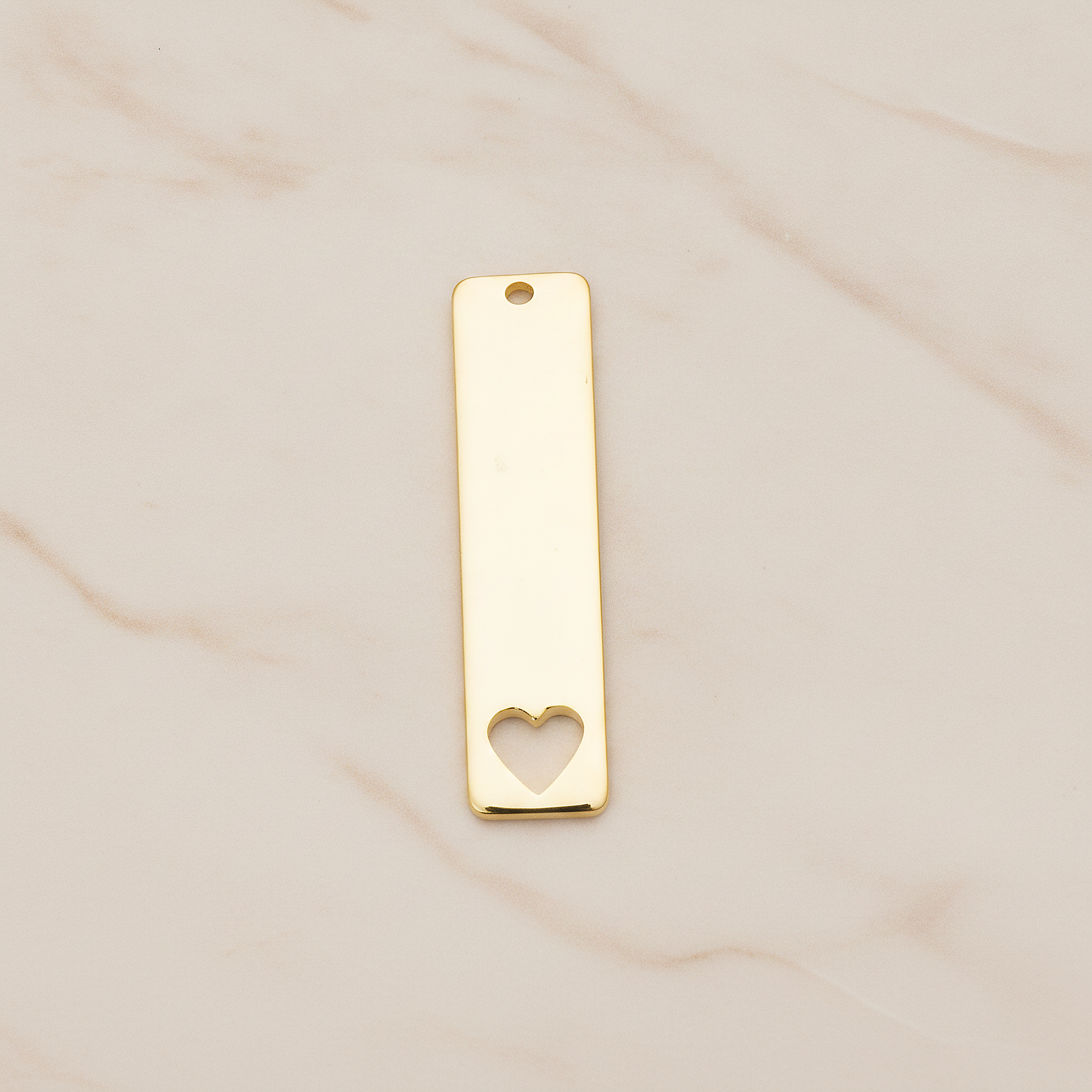 Vertical Heart Silhouette Bar Pendant, 2 Pc on warm marble background (PD.1150)