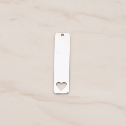 Vertical Heart Silhouette Bar Pendant, 2 Pc on warm marble background (PD.1150)