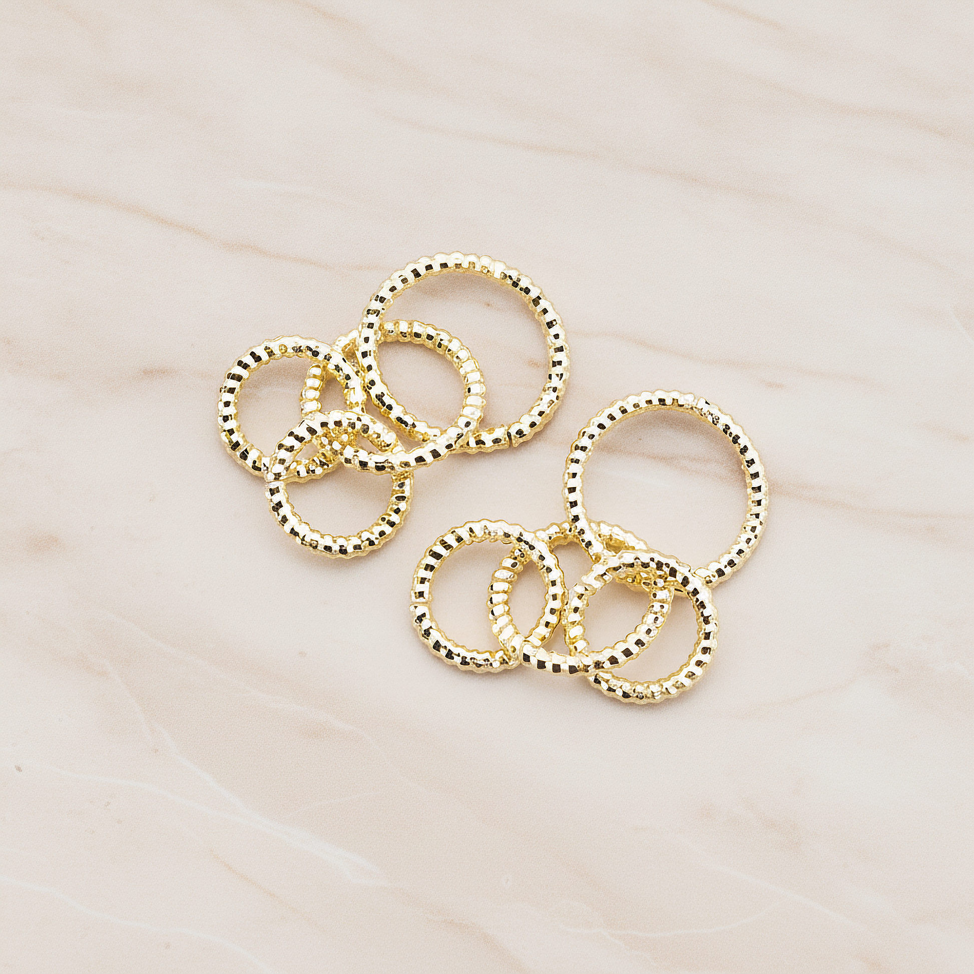 Quadruple Rope Links Tangled Pendant, 2 Pc on warm marble background (PD.116)