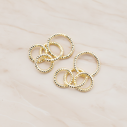 Quadruple Rope Links Tangled Pendant, 2 Pc on warm marble background (PD.116)