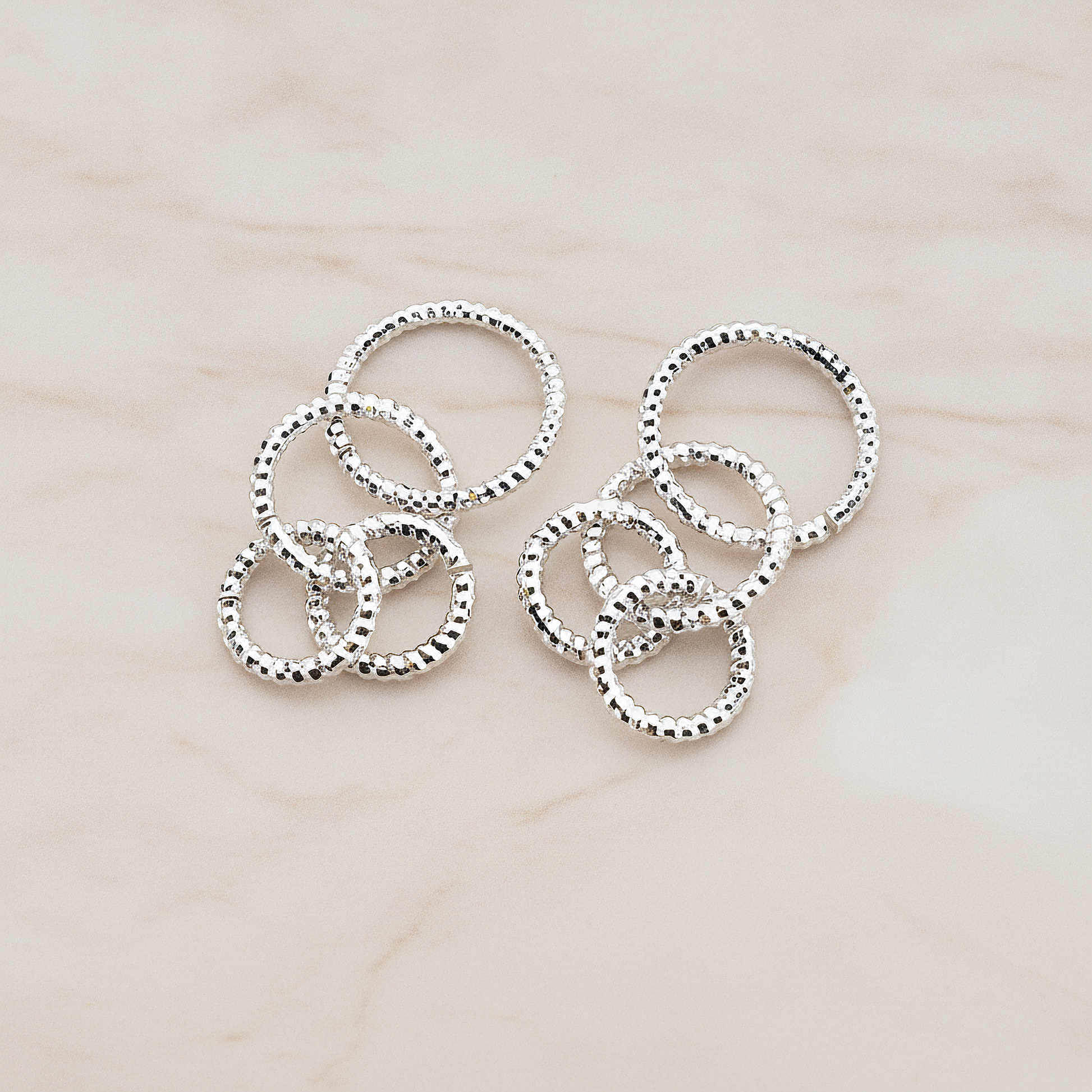 Quadruple Rope Links Tangled Pendant, 2 Pc on warm marble background (PD.116)