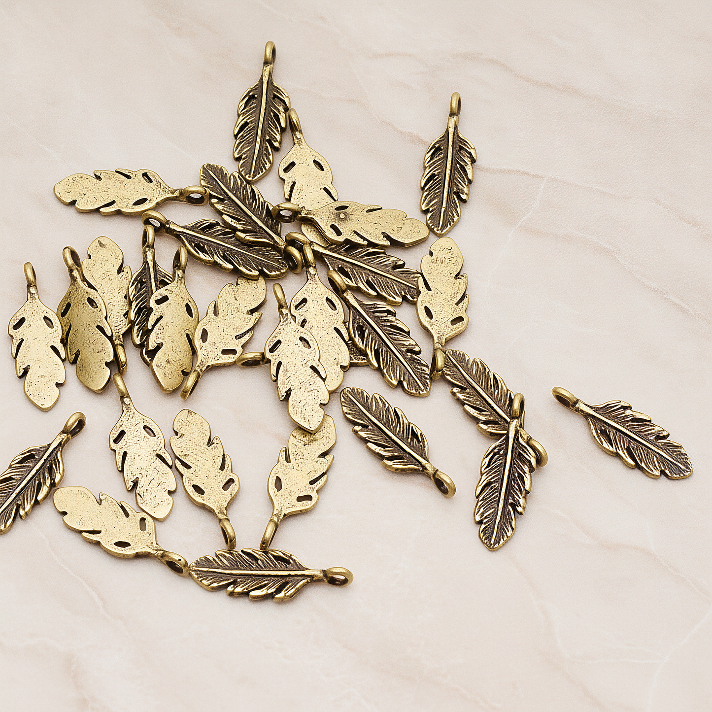 Mini Feather Pendant, 2 Pc on warm marble background (PD.1173)