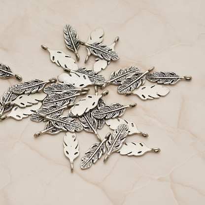 Mini Feather Pendant, 2 Pc on warm marble background (PD.1173)