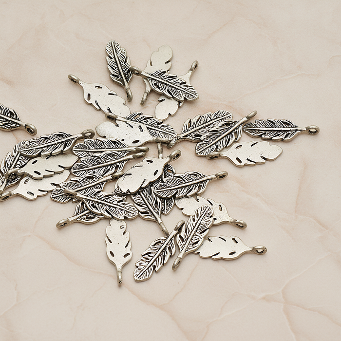 Mini Feather Pendant, 2 Pc on warm marble background (PD.1173)