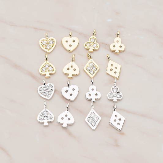Cubic Zirconia Setting Heart Clover Spade Diamond Cham Pendant, 2 Pc on warm marble background (PD.1197)