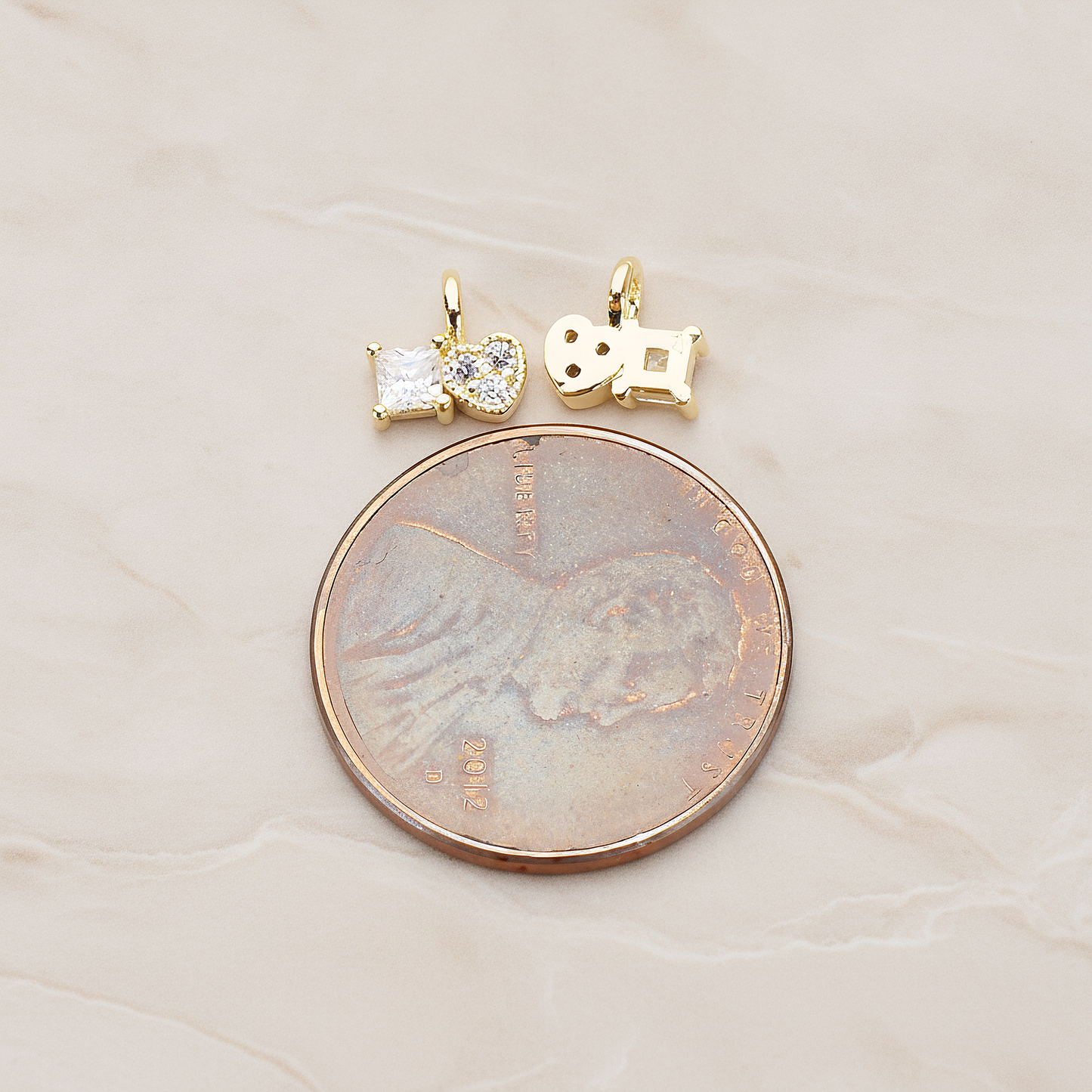 Cubic Zirconia Heart and Square Pendant, 2 Pc on warm marble background (PD.1204)