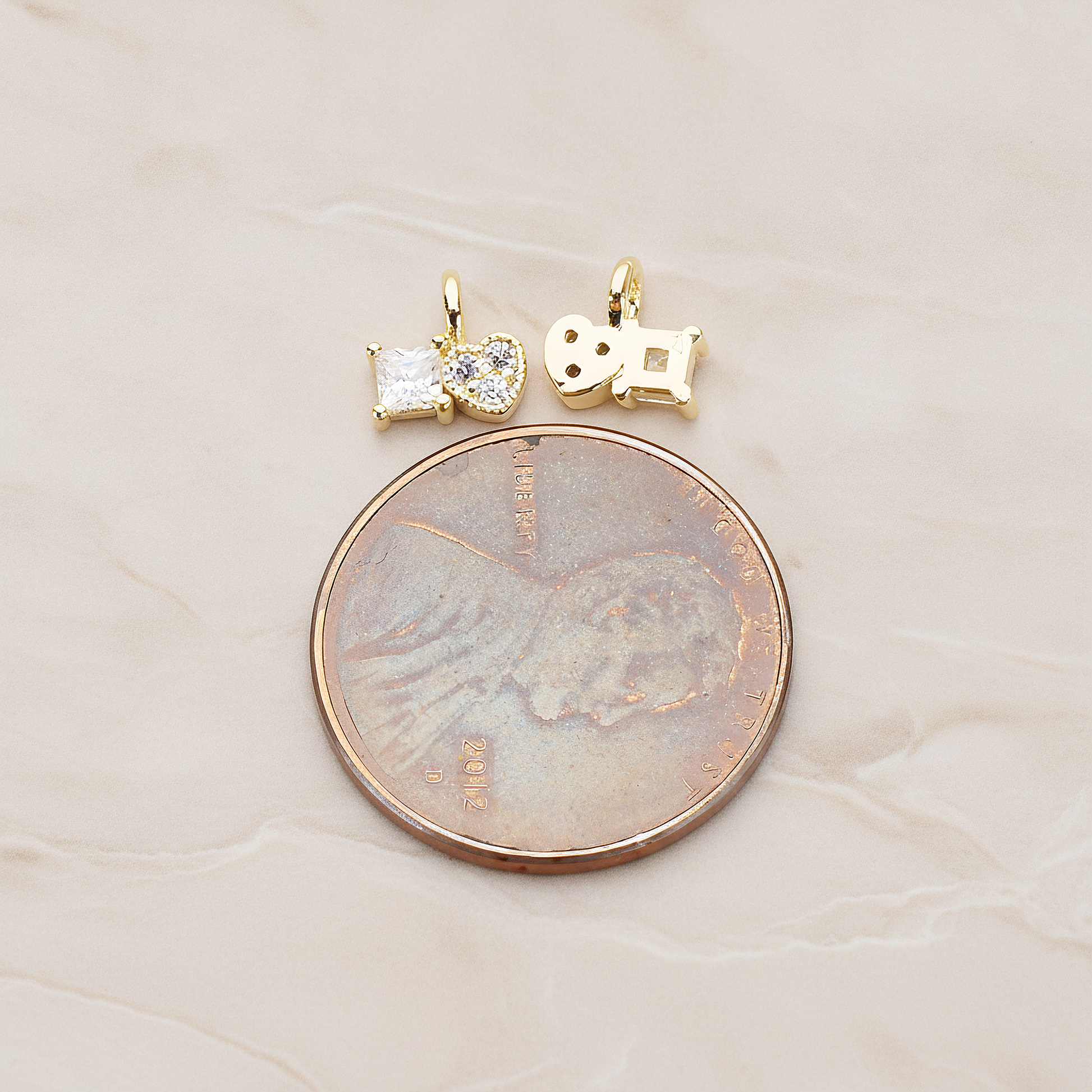 Cubic Zirconia Heart and Square Pendant, 2 Pc on warm marble background (PD.1204)