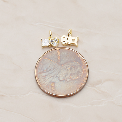 Cubic Zirconia Heart and Square Pendant, 2 Pc on warm marble background (PD.1204)