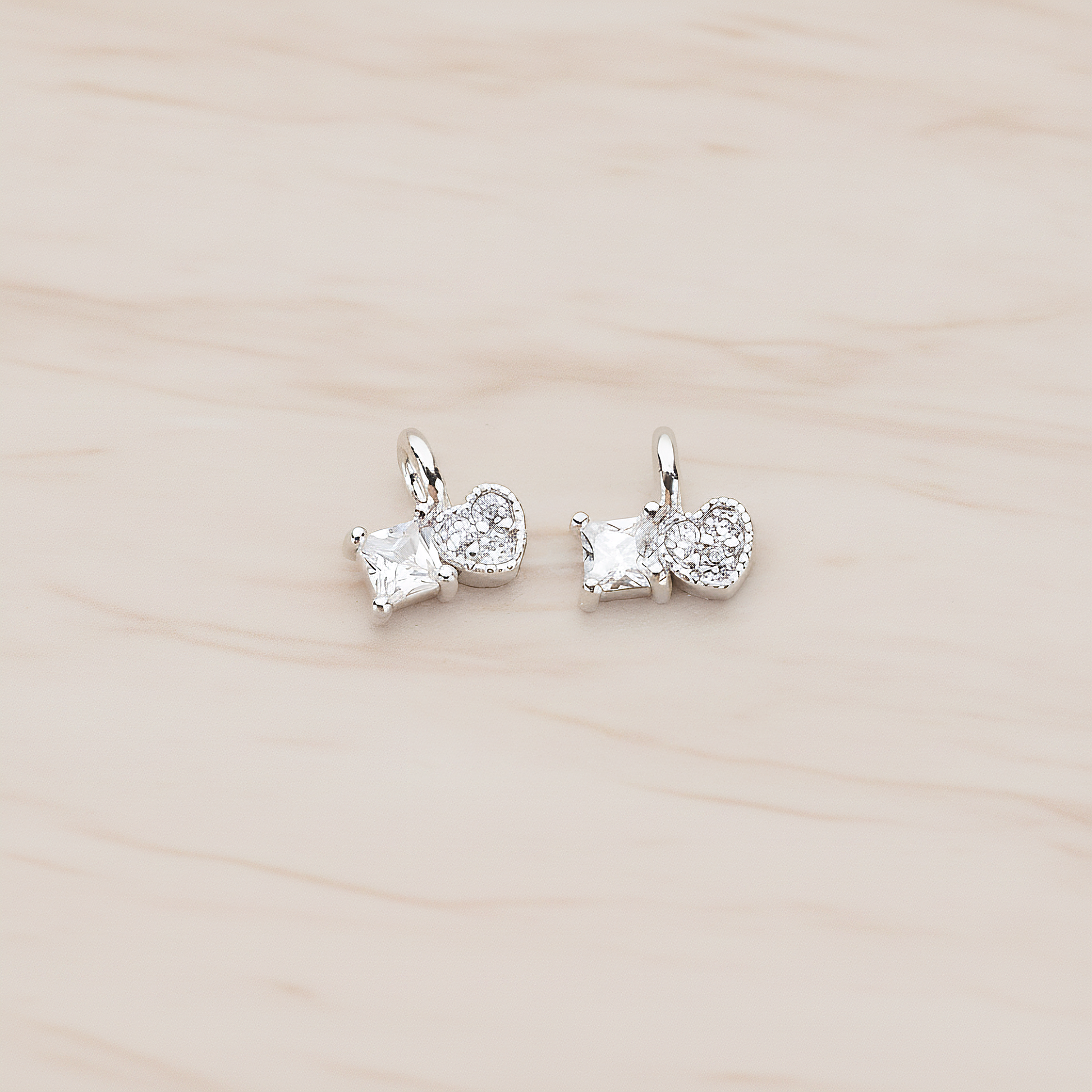 Cubic Zirconia Heart and Square Pendant, 2 Pc on warm marble background (PD.1204)